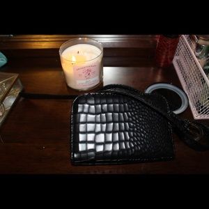 black snakeskin clutch fanny pack